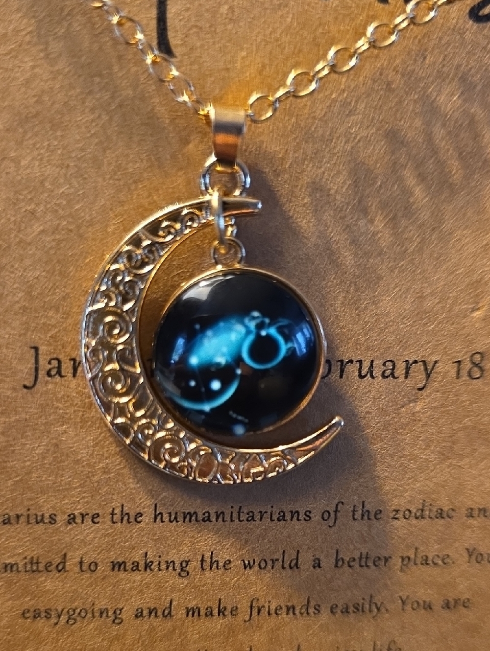 Aquarius Gold-Tone Crescent Moon Necklace with Black Zodiac Pendant - Picture 8 of 9